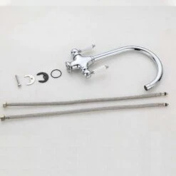 Kitchen Sink Mixer Tap Elegant White Ceramic Dual Lever Monobloc Swivel Spout Chrome Kitchen Taps With UK Standard Fittings 10 Kitchen Sink Mixer Tap Elegant White Ceramic Dual Lever Monobloc Swivel Spout Chrome Kitchen Taps With UK Standard Fittings -Home Sale Shop 59500070 4